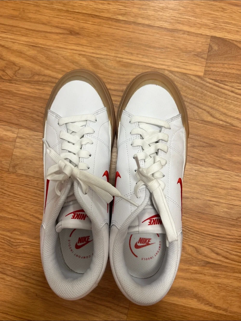 Nike White Leather Sneakers with Red Swoosh and Gum Sole